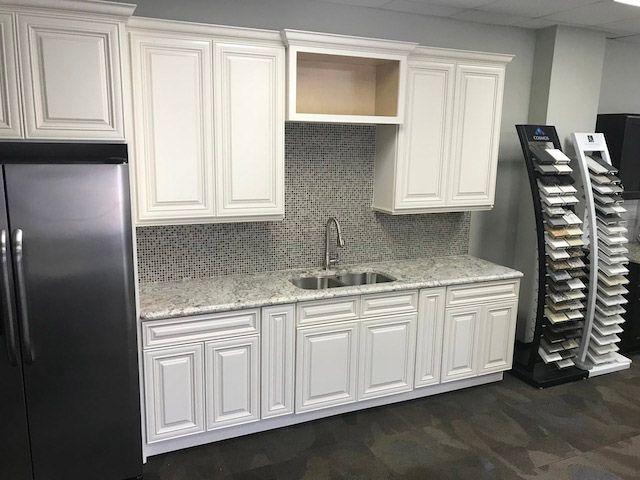 White cabinets granite countertop